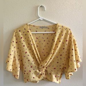 Brand is active USA color yellow with pretty tiny floral print size small